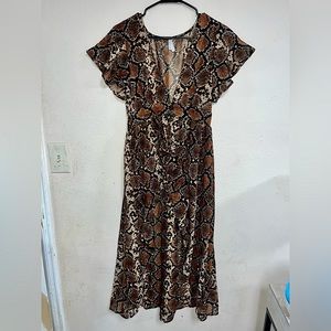 Live 4 Truth snake print duster kimono.